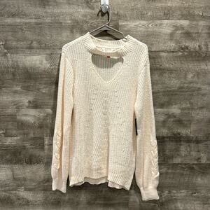 No Boundaries NWT Cream cutout Sweater in 100% Polyester with long sleeves.